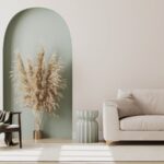 Small decorative details like pampas grass and soft tones create a cozy mood in a modern living room