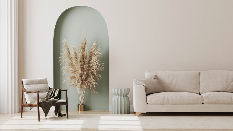 Small decorative details like pampas grass and soft tones create a cozy mood in a modern living room